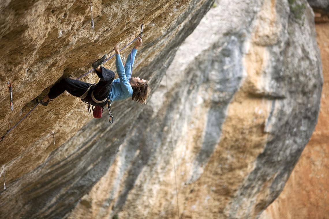 Chris Sharma climbing Gancho Perfect (9a or 5.14b) in Margalef, Spain. Photo by Corey Rich. / Aurora Photos.