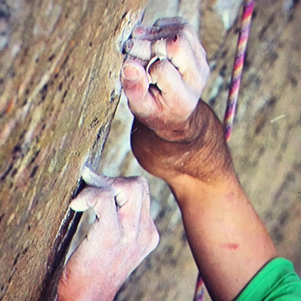Kevin's fingers on the crux holds of pitch 15. Screen grab by SparkShot Climbing
