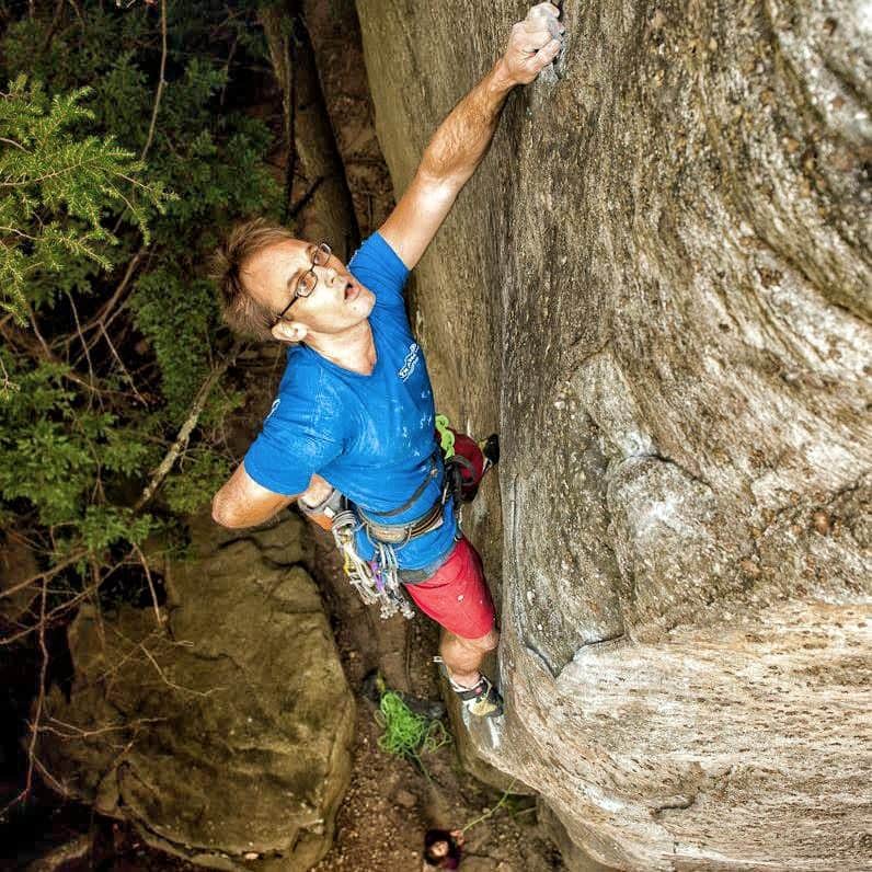 The author on the FA of "Are You an Idiot?" (5.12 R).  Photo: Dan Brayak