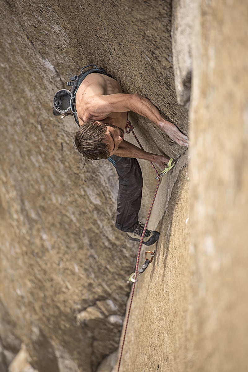 Fixed pins and ancient bolts. Kevin Jorgeson on the Dawn Wall. Photo:  Corey Rich