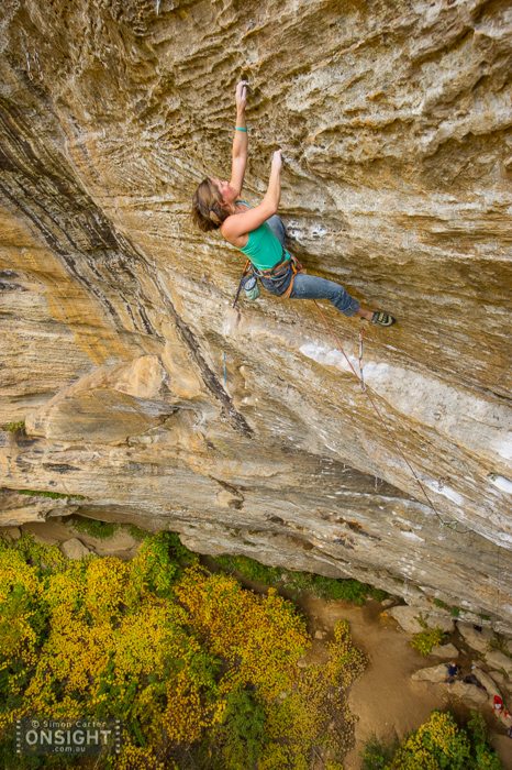 Whitney Boland on Pushing Up Daisies (5.13d), Madness Cave. Photo: Simon Carter.